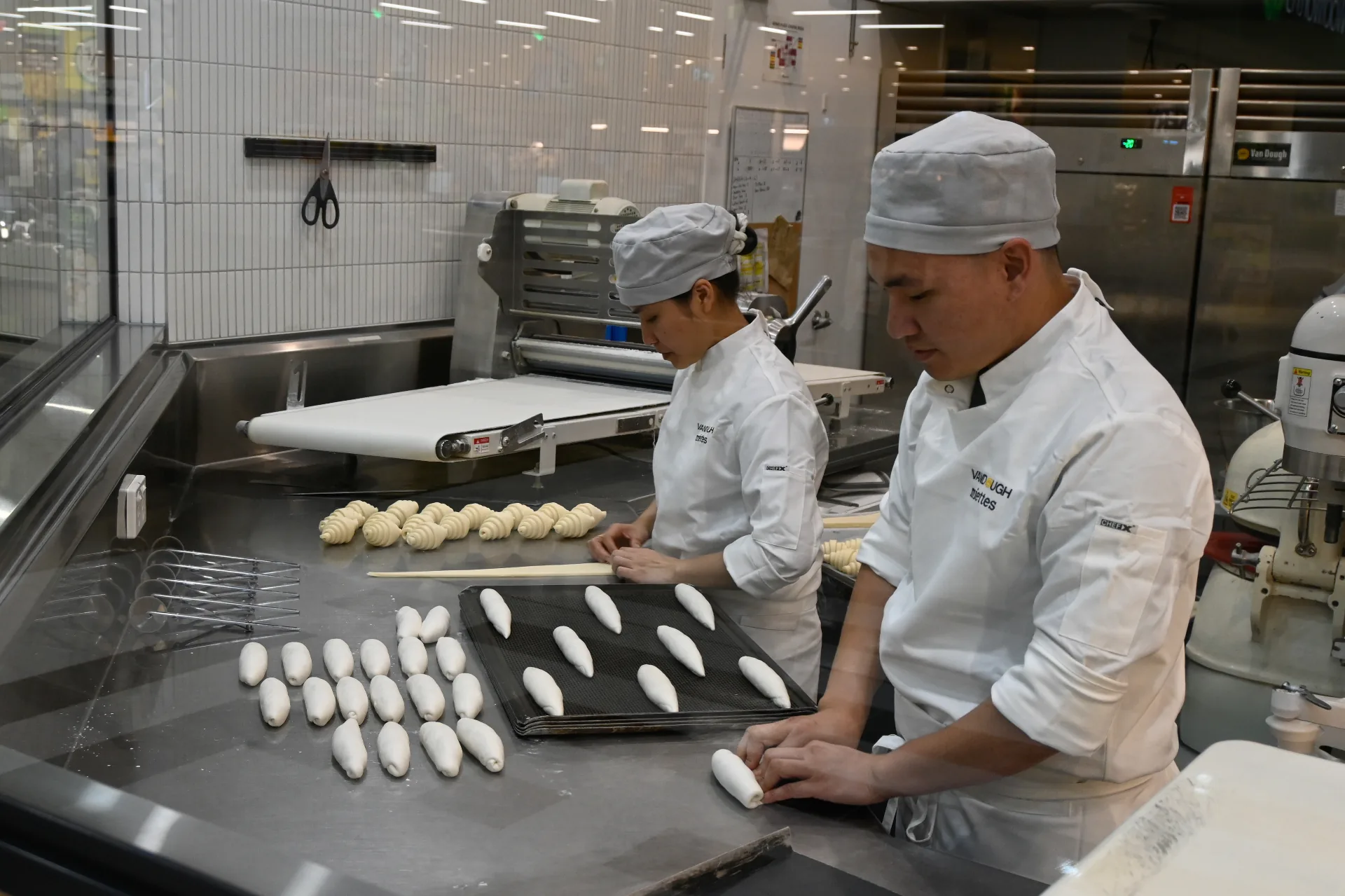 Bakers laminating butter into dough at Austral's Rocklea plant